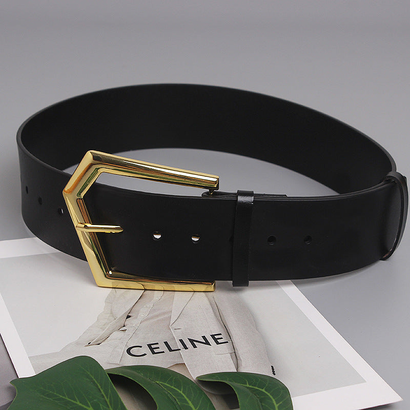 Grande ceinture large en peau de vache à boucle de goupille de forme concave