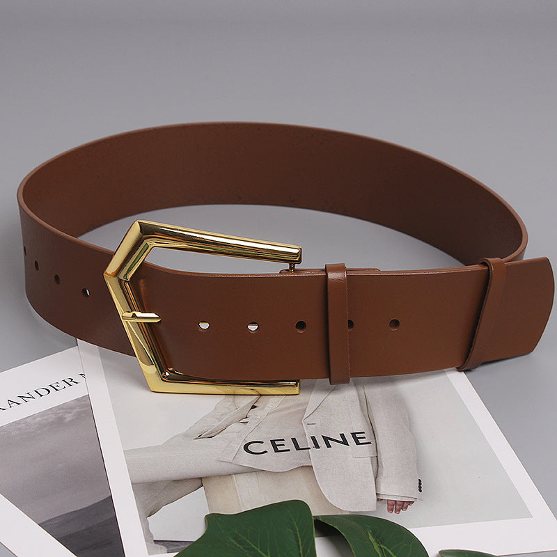 Grande ceinture large en peau de vache à boucle de goupille de forme concave