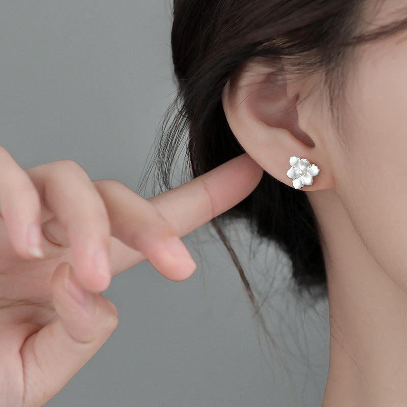 Boucles d'oreilles à perles en forme de fleur blanche neige
