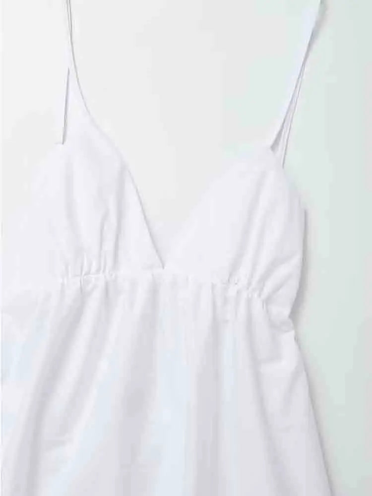 Robe mi-longue dos nu à col en V