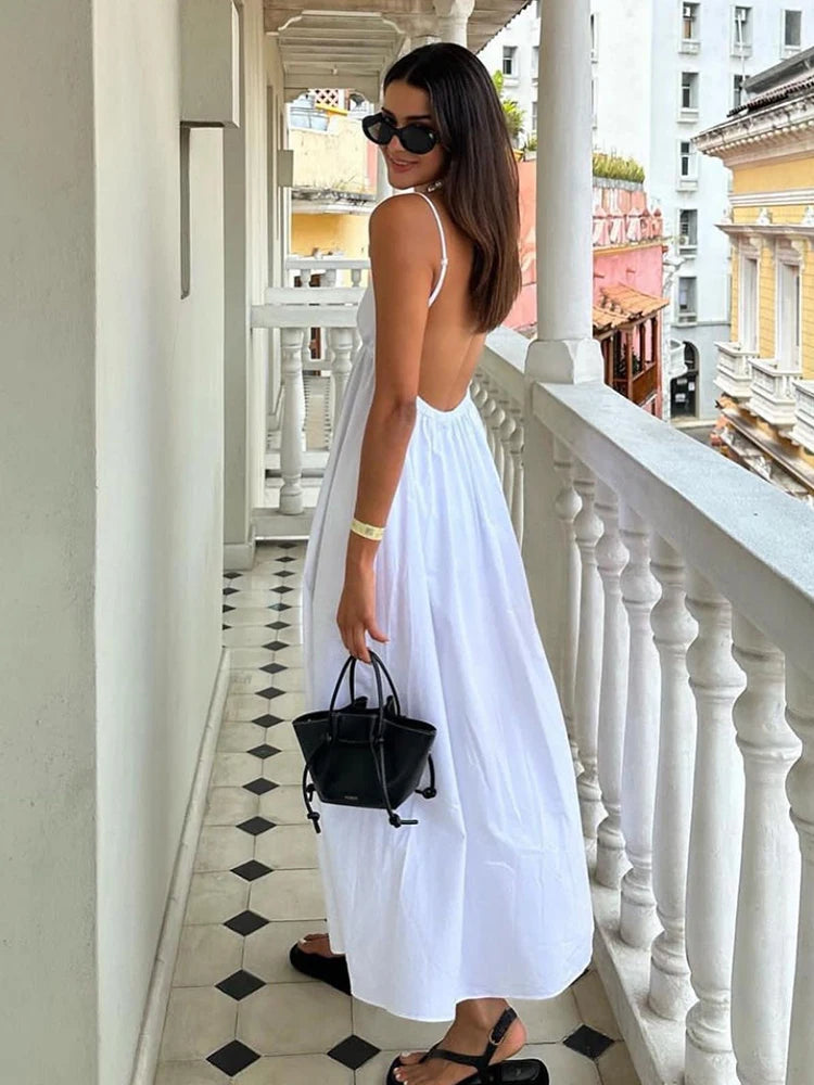 Robe mi-longue dos nu à col en V