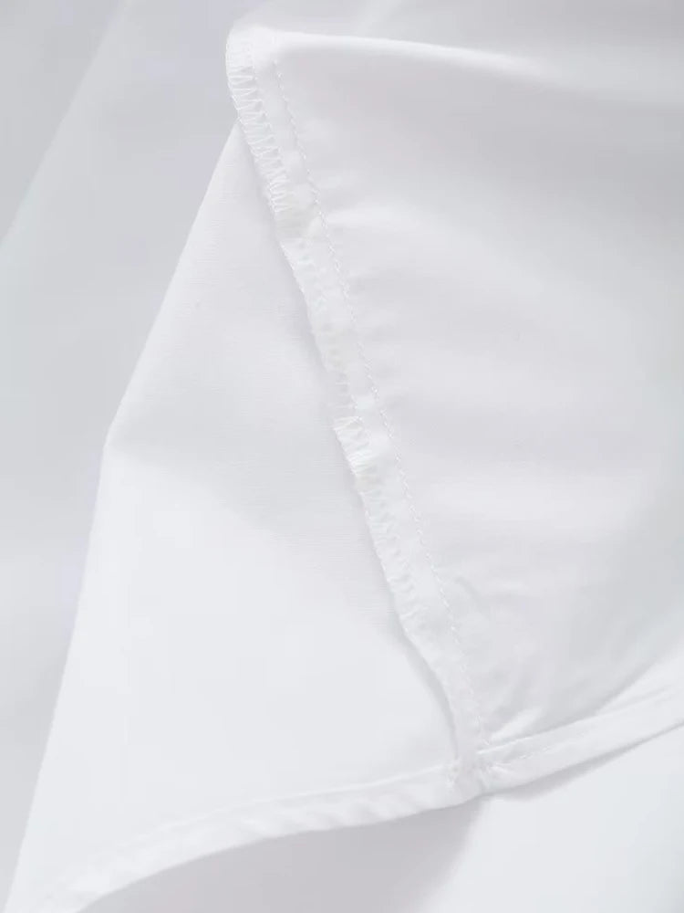 Robe mi-longue dos nu à col en V
