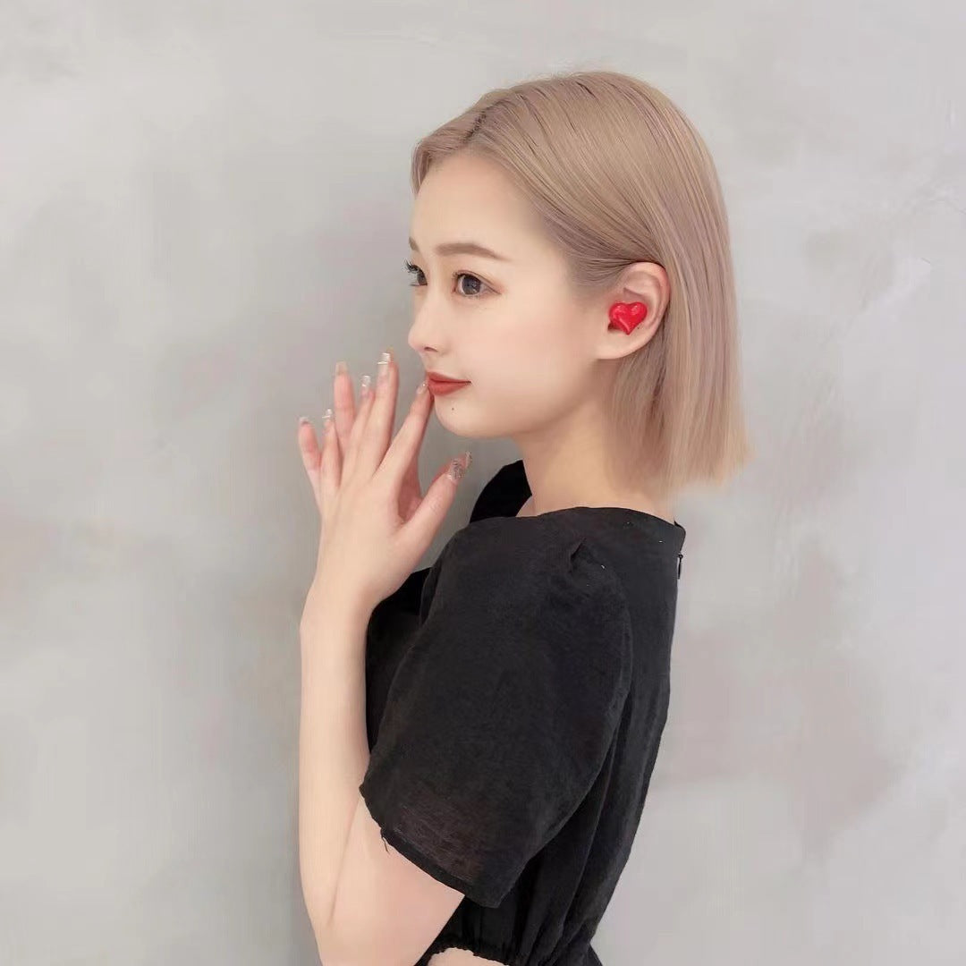 Écouteurs Bluetooth en forme de coeur