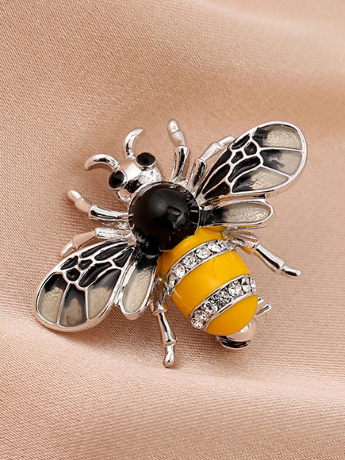 Broche abeille ornée de perles d'imitation