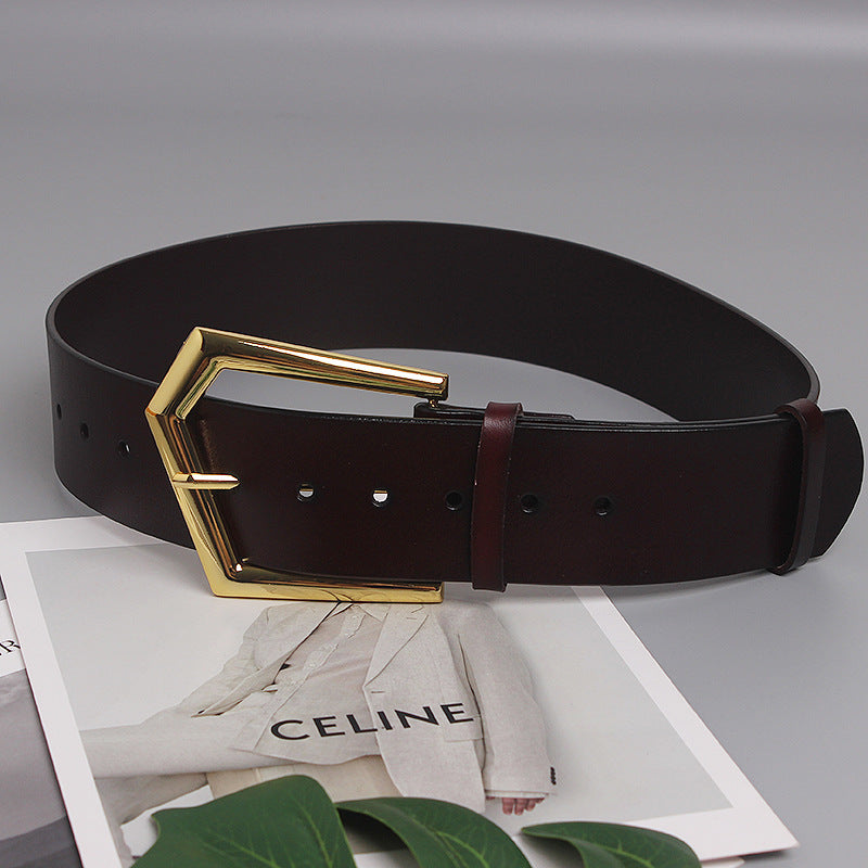 Grande ceinture large en peau de vache à boucle de goupille de forme concave