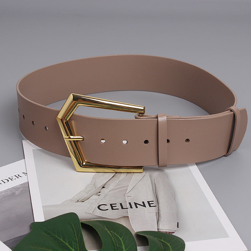 Grande ceinture large en peau de vache à boucle de goupille de forme concave